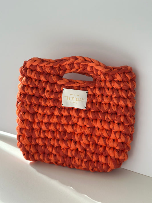 Handmade Crochet Bag - Capture the warmth of golden hour with the Sunset Glow Crochet Bag, a handcrafted artisan piece bursting with the rich, fiery hues of a setting sun.